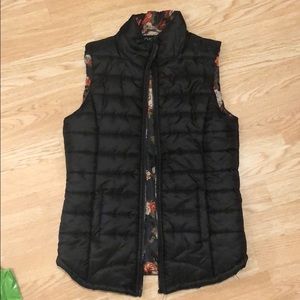 Black vest with floral pattern